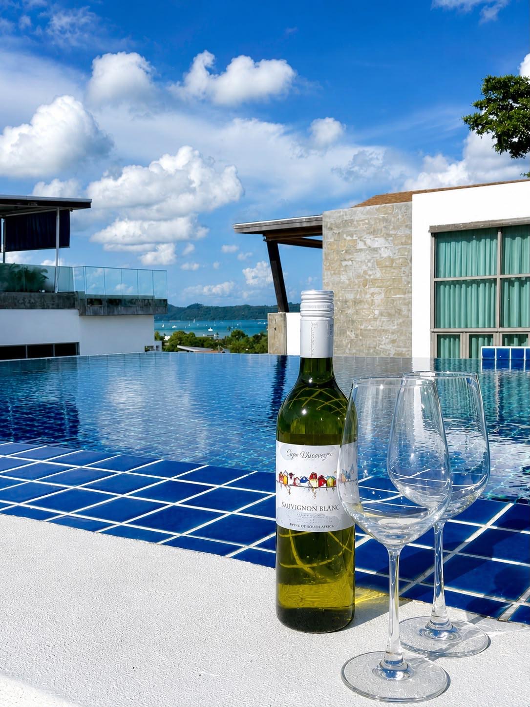Sunset drinks by the rooftop pool
