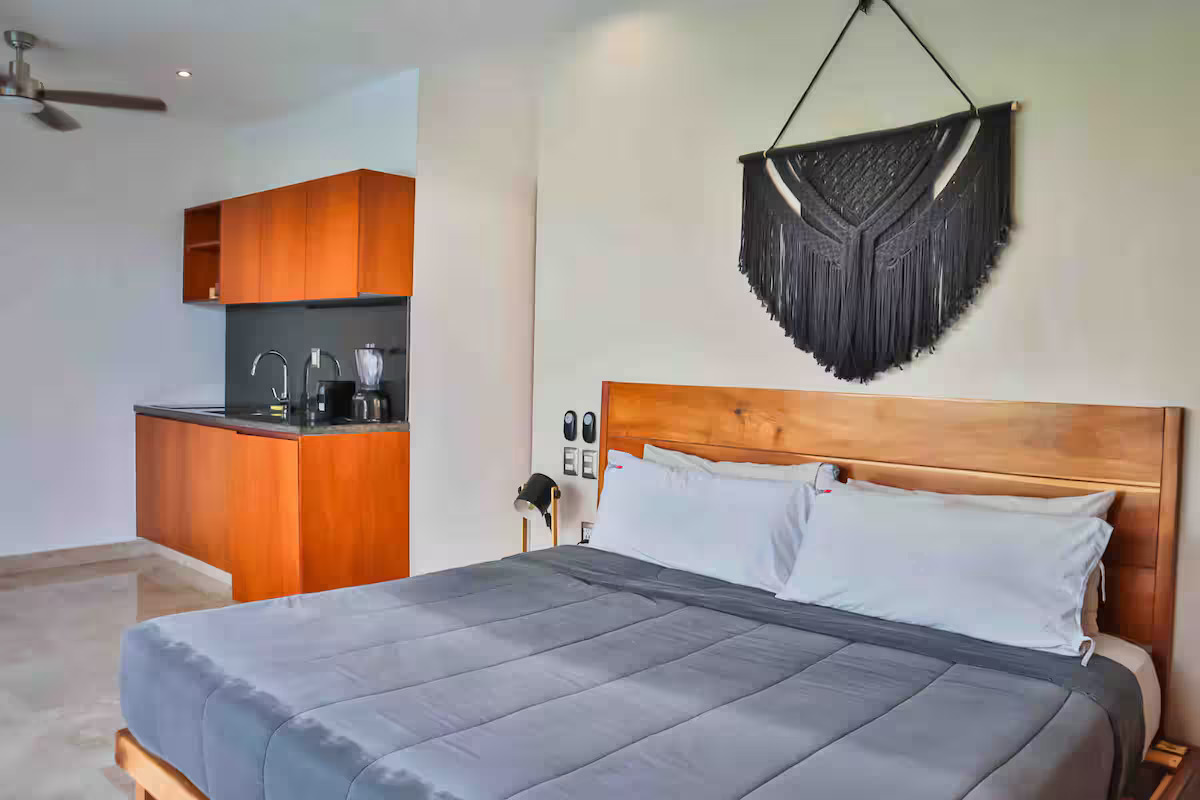 Bedroom with kitchenette and smart TV