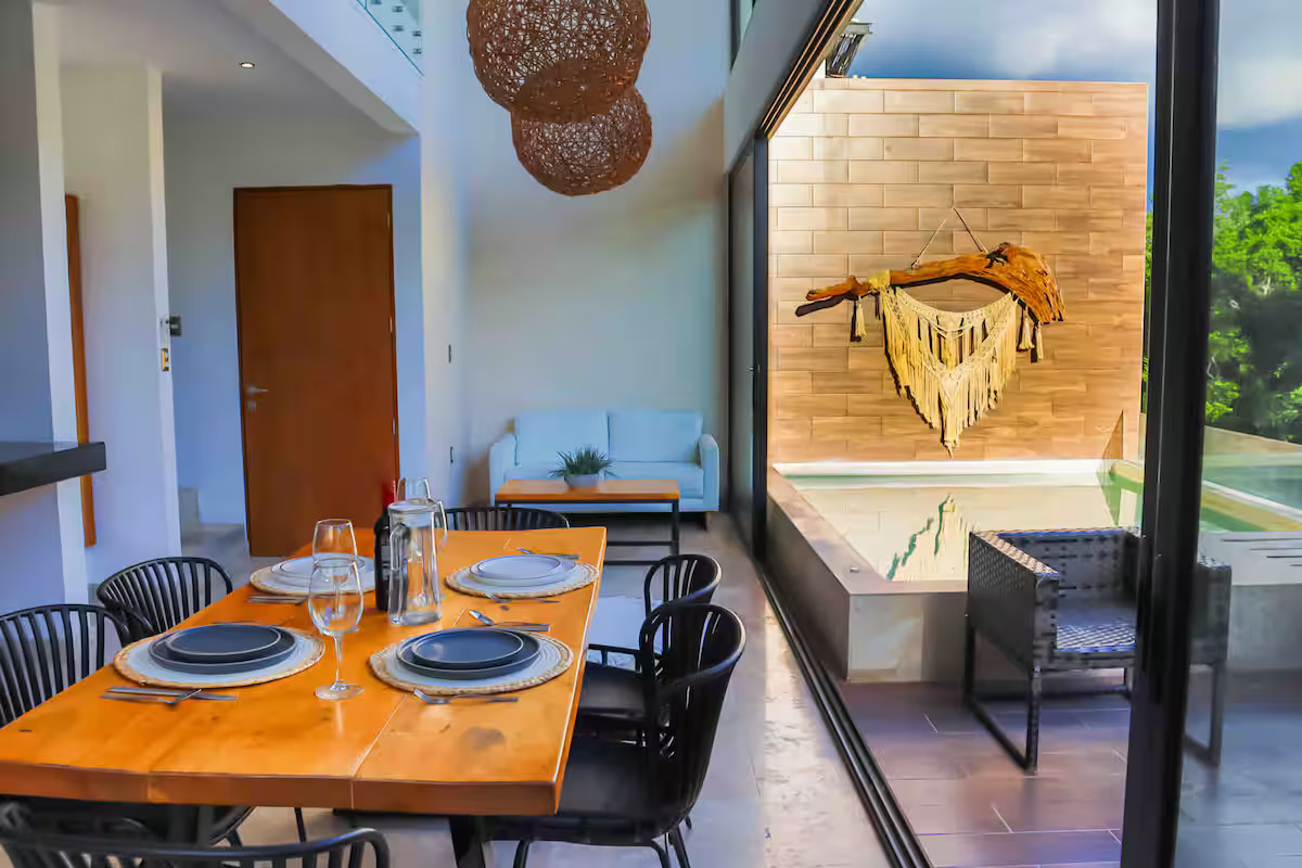 Dining table beside the plunge pool terrace