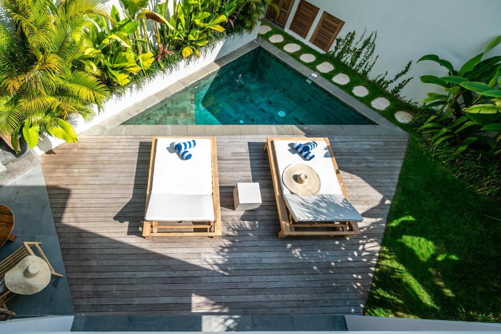 Yume by Nyara — pool deck at noon